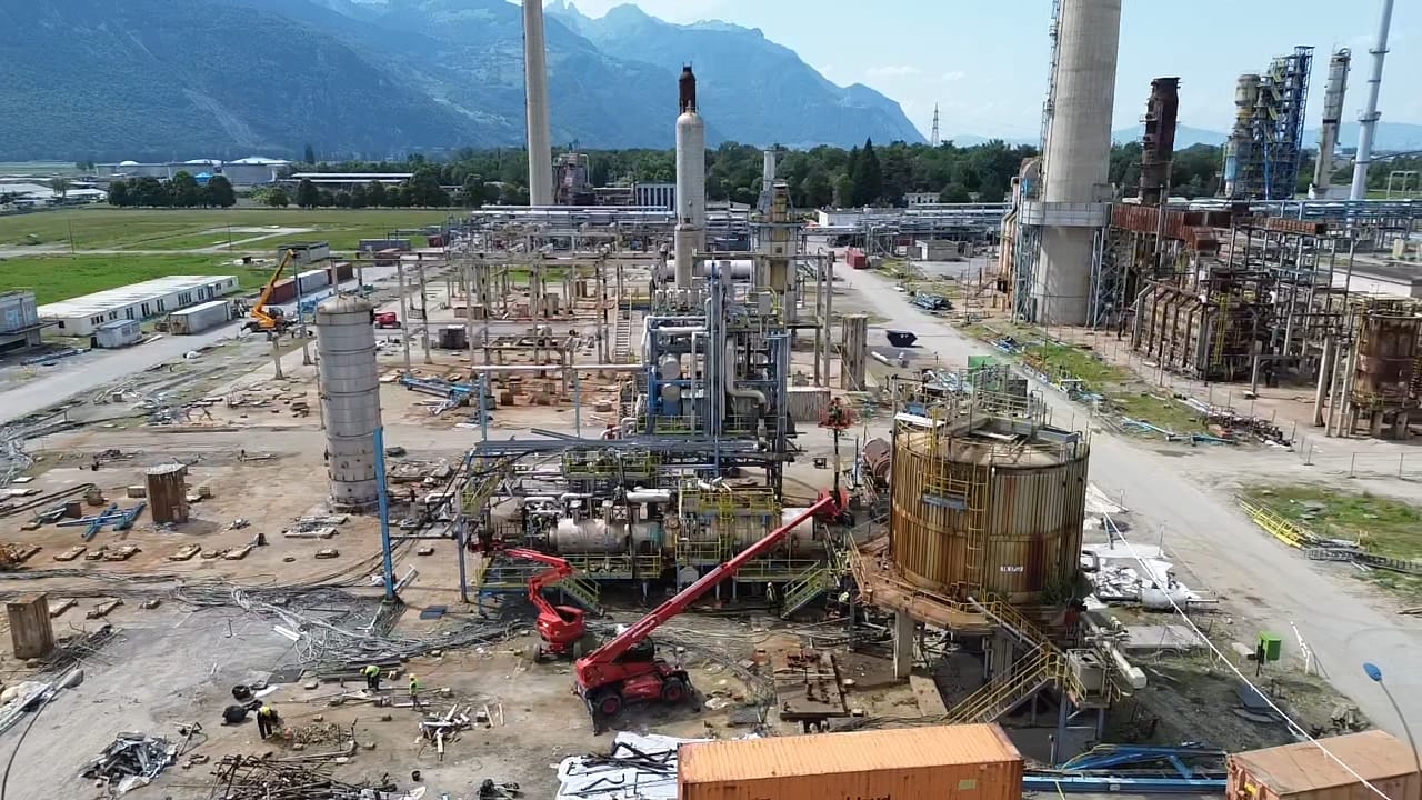 Aerial view of a plant dismantling site with aerial work platforms