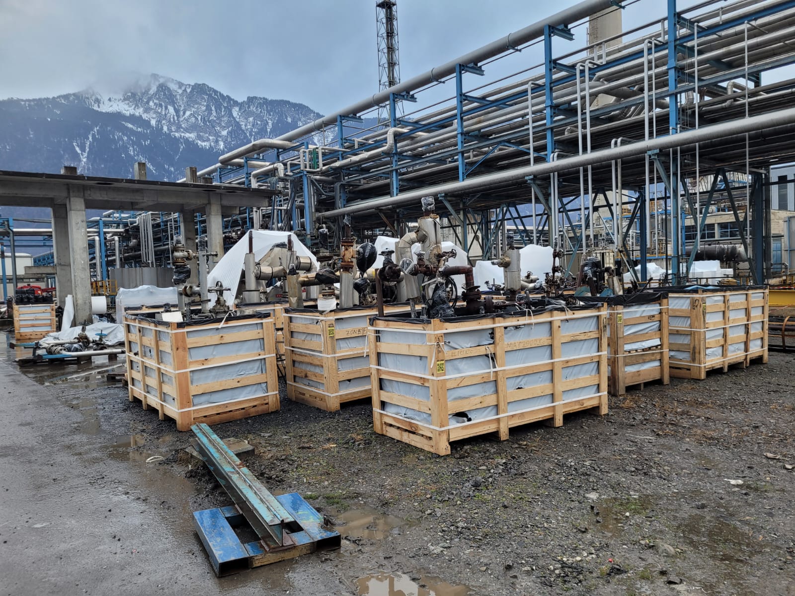 Wooden transport crates packed with valves and piping
