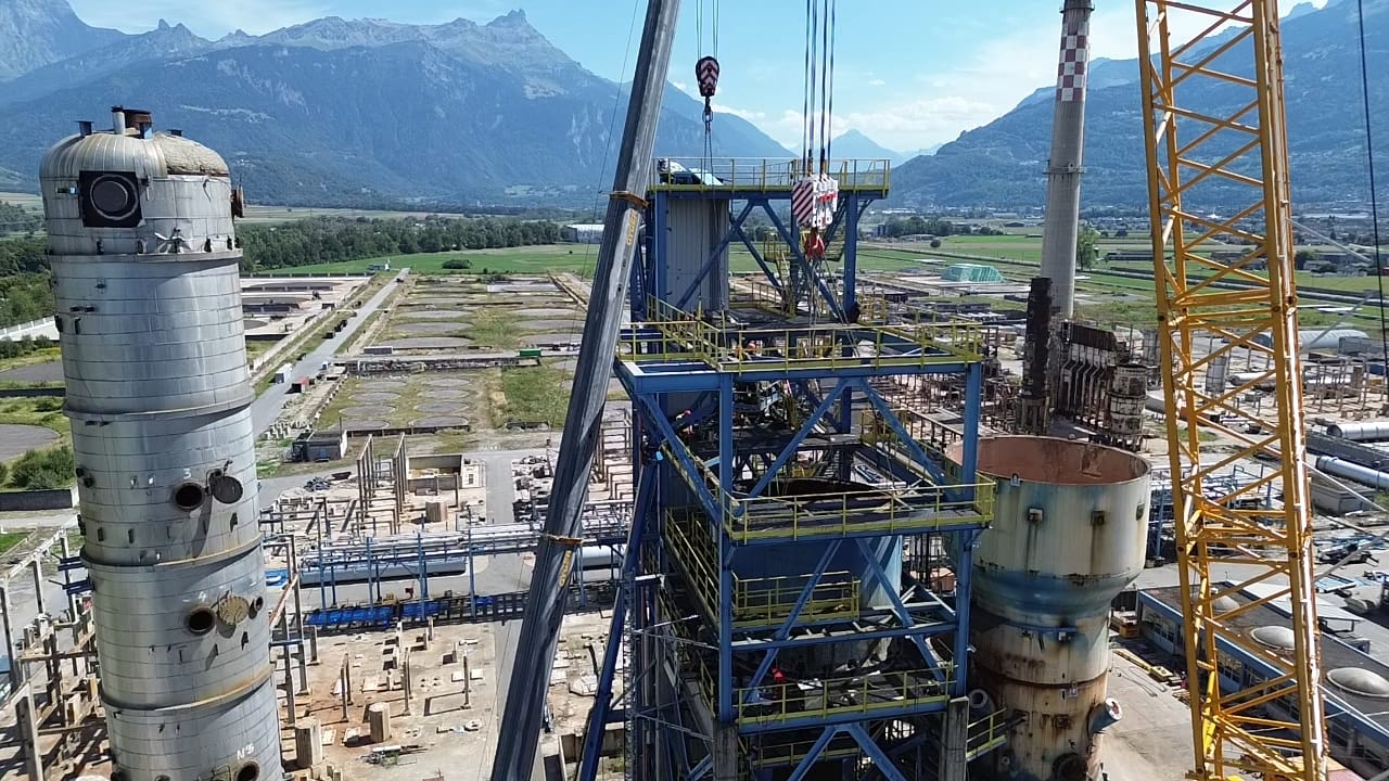 Crane lifting a column during dismantling